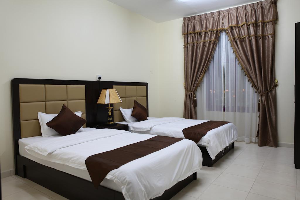 Oasis Residence Fujairah Rom bilde
